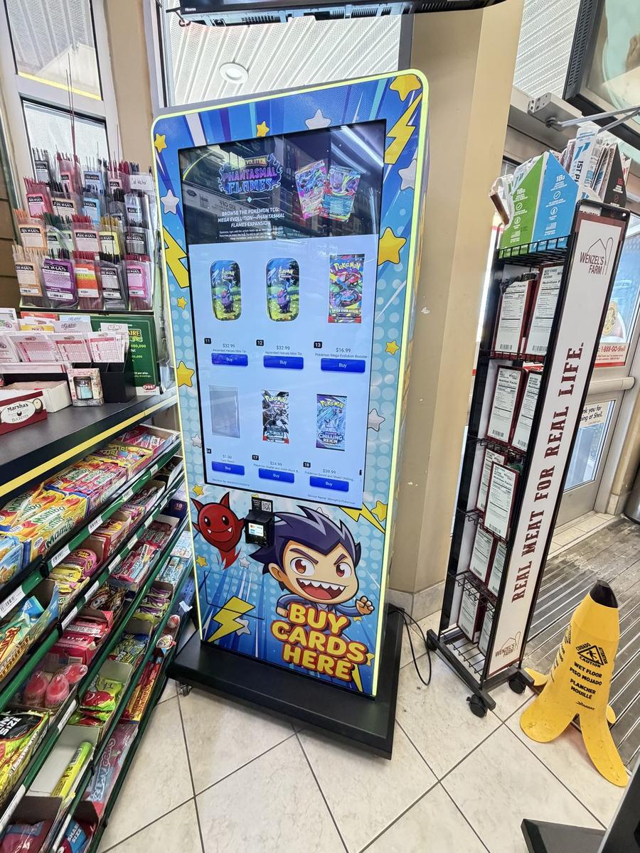 A card vending machine installed and running inside a host venue